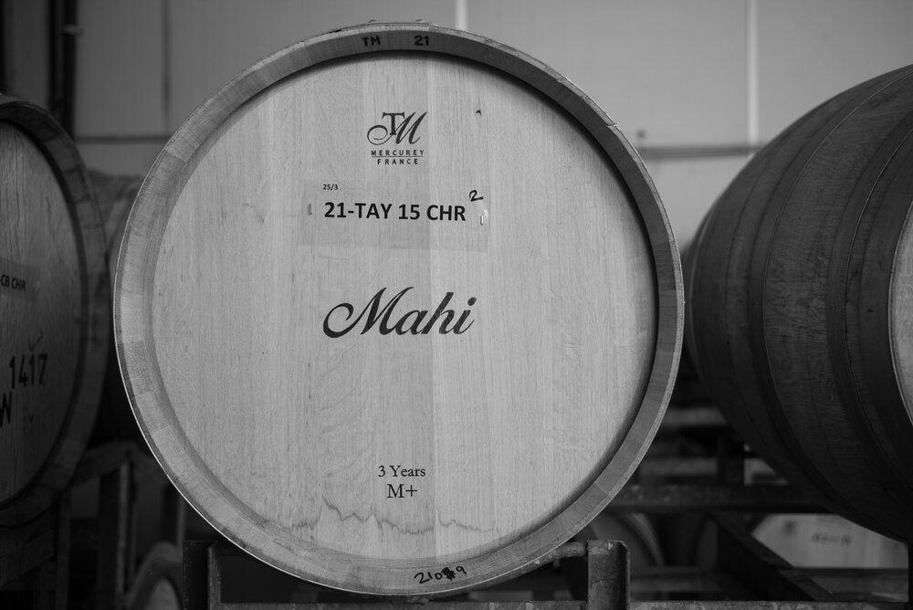 Oak barrel at Mahi Winery used for aging wine, featured at Chesil Rectory's Winemakers Dinner Winchester