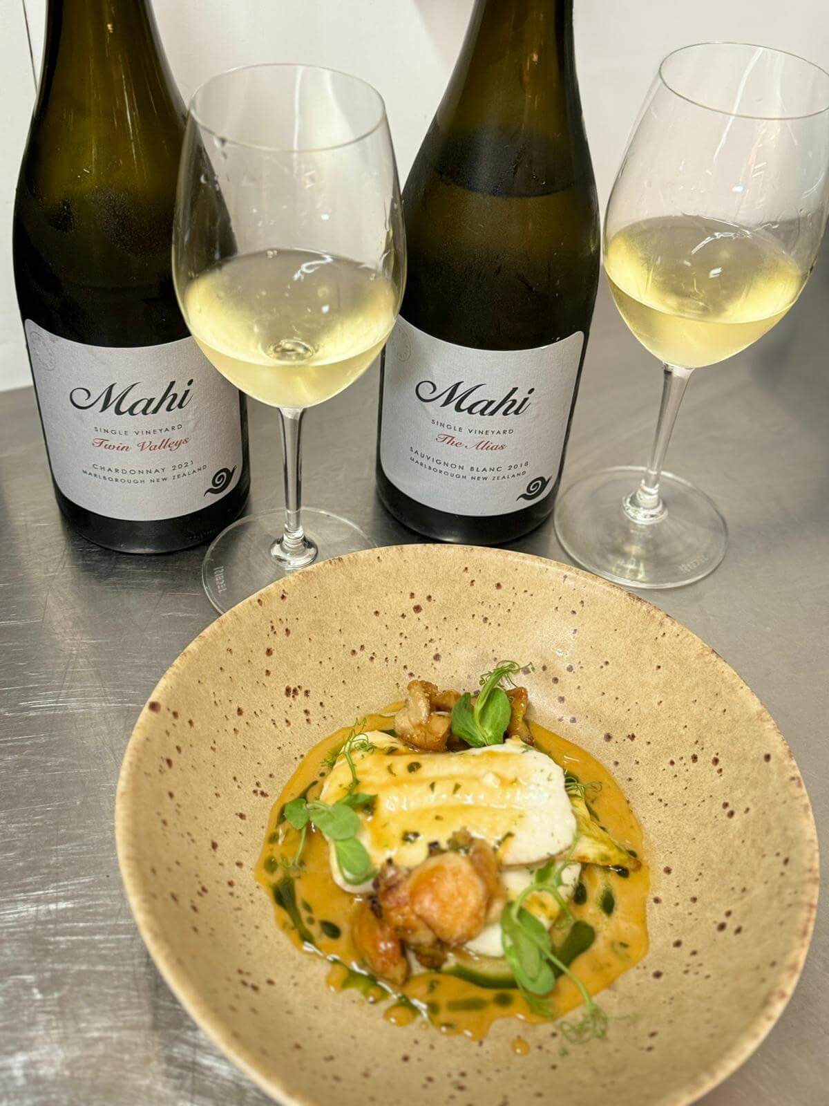 2018 Alias Sauvignon Blanc and 2022 Twin Valleys Chardonnay served with South Coast Plaice, Chicken Wings, and Chicken & Tarragon Cream at Chesil Rectory's Winemakers Dinner Winchester