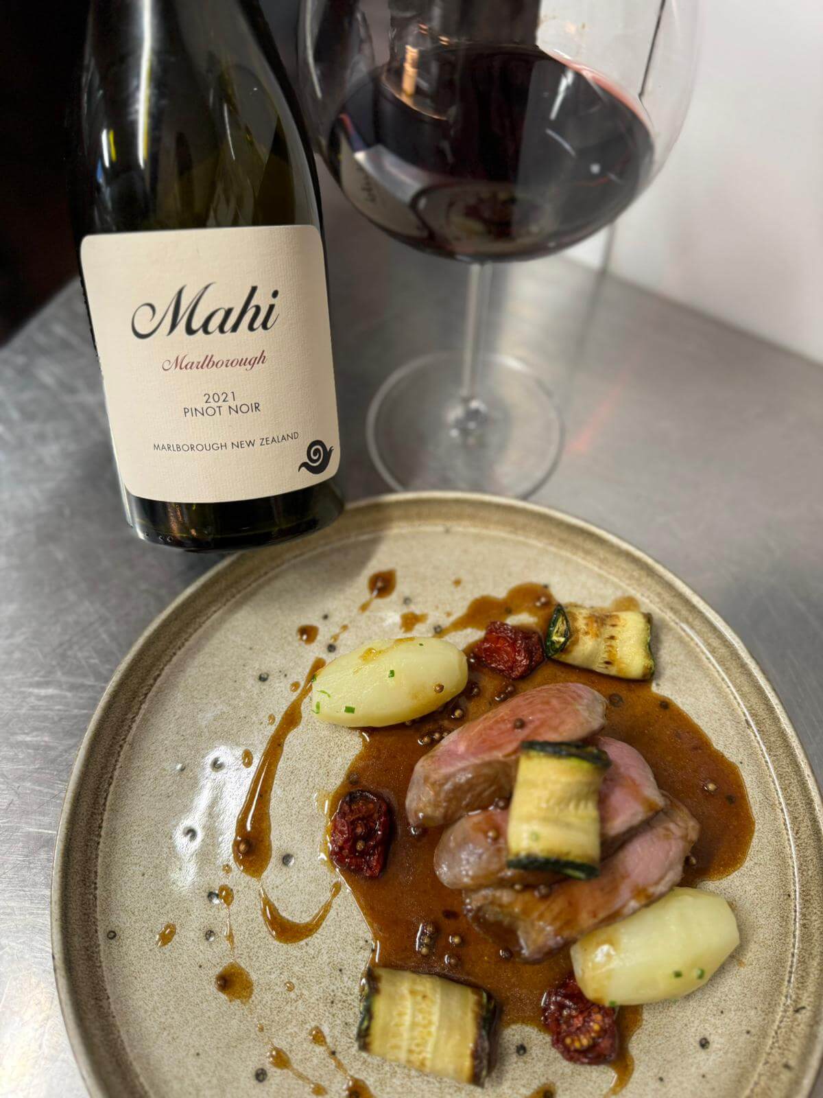 2021 Mahi Pinot Noir paired with Hampshire Lamb Rump, Crispy Belly, Courgette Ribbons, Turned Potatoes, Vierge Dressing & Jus at Chesil Rectory's Winemakers Dinner Winchester