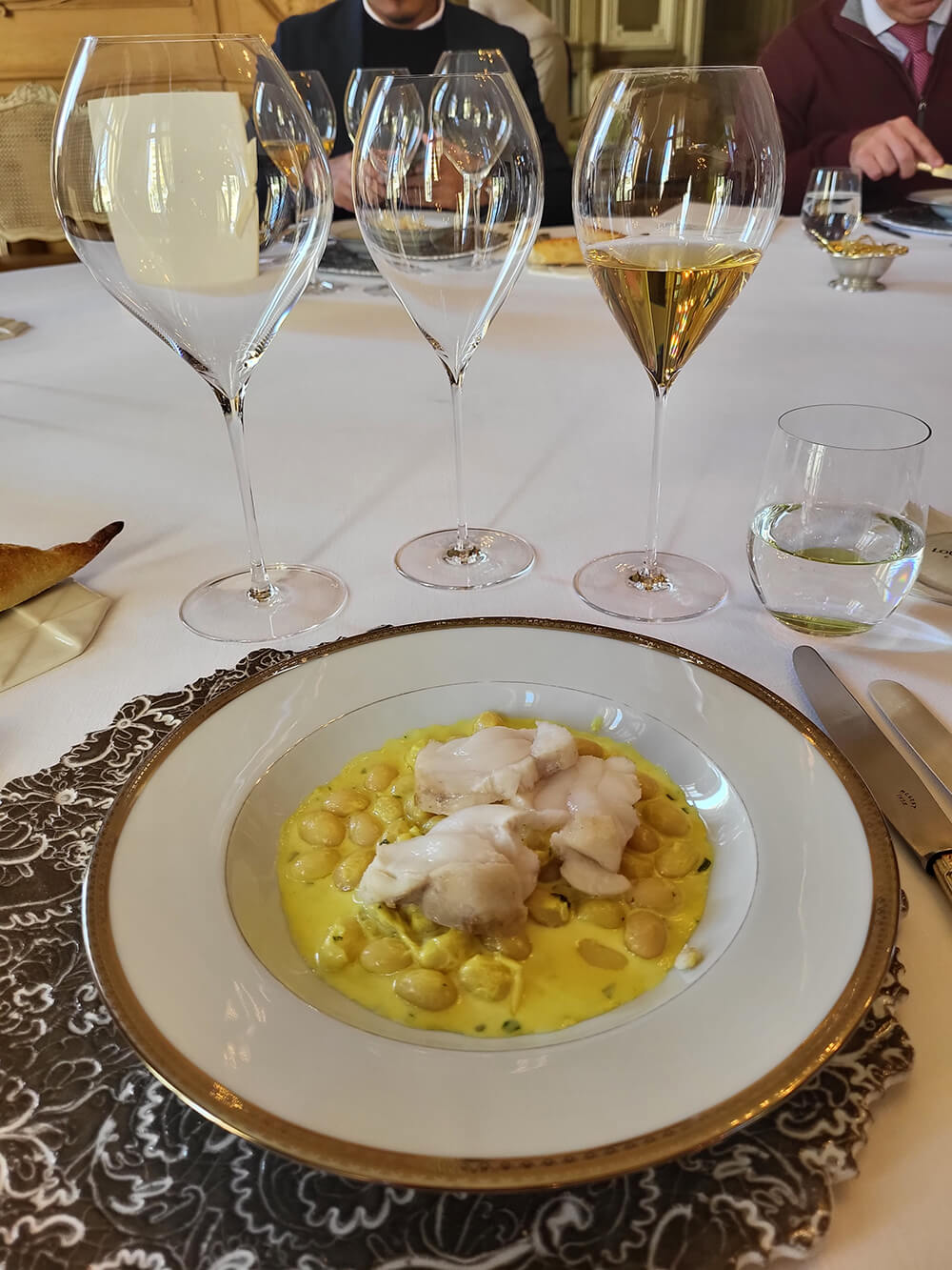 Monkfish with white bean cassole enjoyed during Chesil Rectory's wine experience paired with '93 vintage Cristal